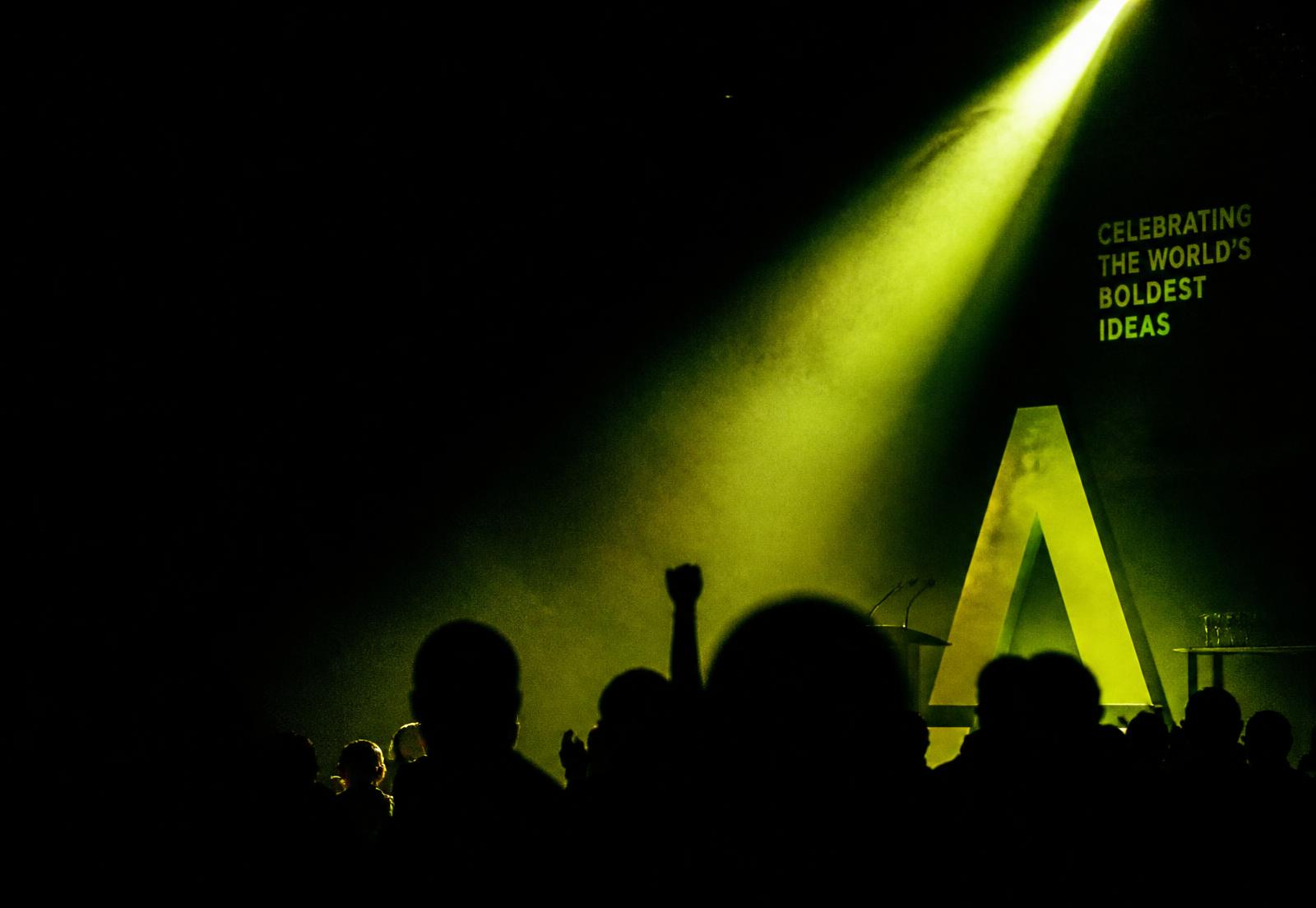 Spotlight cutting through an advertising awards audience
